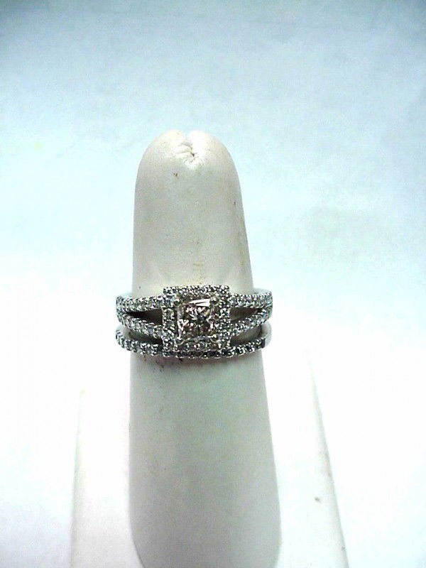 14kwg princess diamond bridal set 1.25ctw: Lady's 14kwg diamond bridal set 6.3 grams with one princess cut diamond weighing approx. .50ct with VS2 clarity and J color. Rings contain micropave diamonds .75ctw. Finger size 6 1/2.