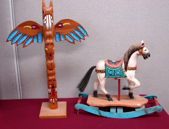 Cherokee Totem Pole, Hand Painted Carousel Horse+: Cherokee Totem Pole signed 25" tall, a Hand Painted Carousel Horse on Rocker; 19" l x 17" h.