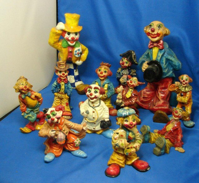 Lot of 12 clowns hand painted in Mexico,: Lot of 12 clowns hand painted in Mexico, tallest two (9.5" & 9)) are paper mache signed Alvarez, Mexico, and 10 are probably hand painted plaster, most also signed Alvarez Mexico, we see chips on only