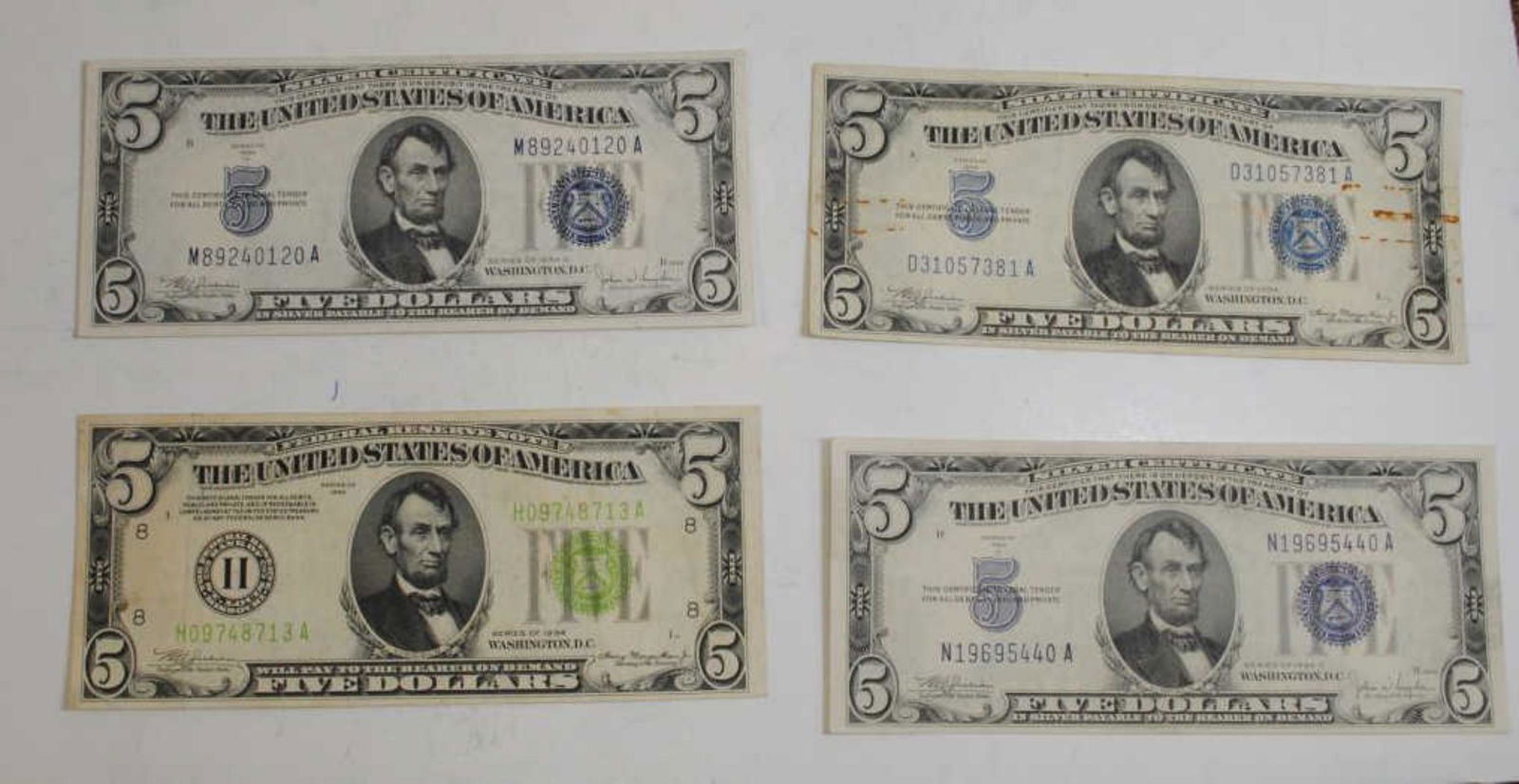 (4) 1934 $5 Silver Certs. in Average Condition (1 of 2)