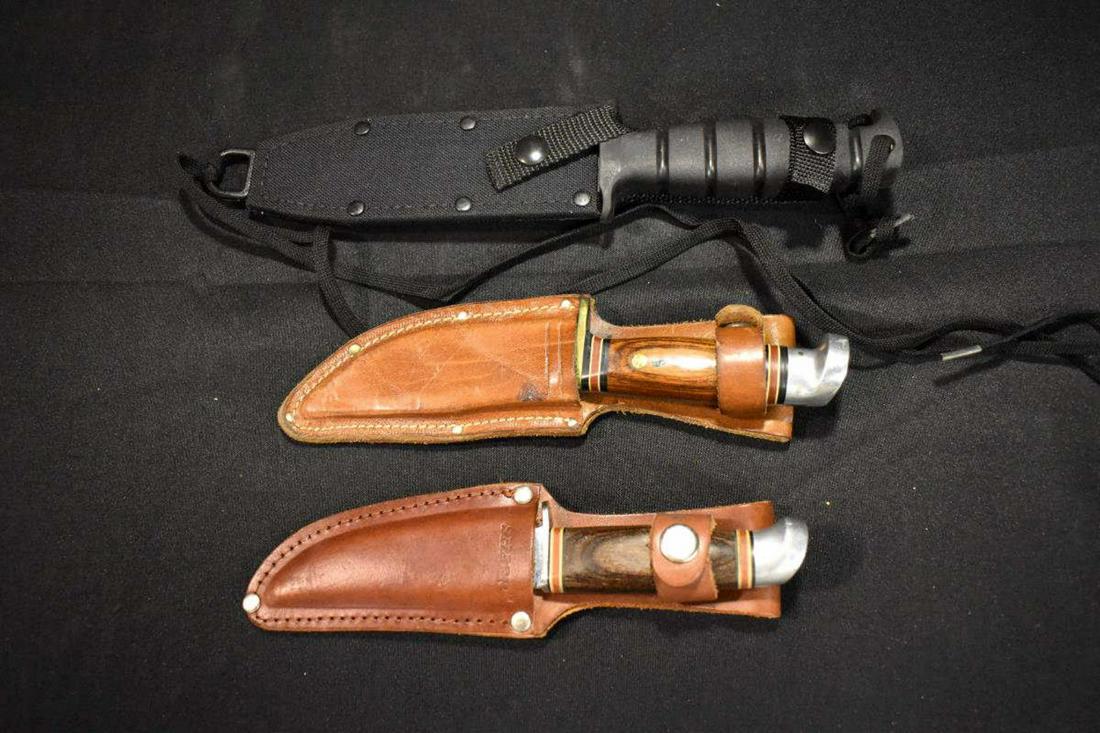 Group Of Knives: Group Of Knives. Total of 3 knives in the group. Consists of Spec Plus Ontario Knife Co. Made in U.S.A. Spec Plus4 Navy. Comes with black sheath. Measures 11" in diameter. Comes with box. Western USA 