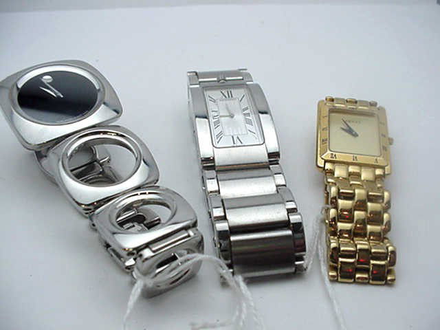 2 stainless Movados & Gucci watch: Man's stainless Movados sapphire crystal,swiss movement,water resistant and goldtone Gucci watch.
