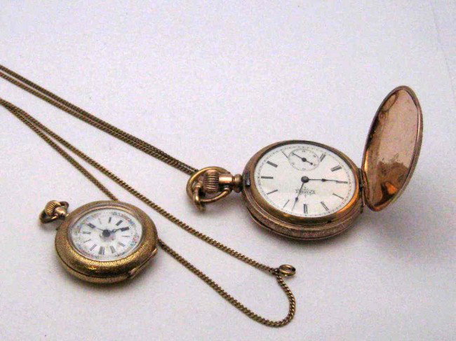 14kyg Locle pocket watch & Elgin: 14kyg Locle pocket watch 23gr with white floral enamel dial and Elgin gold-filled with white roman dial and fob both in good working condition.