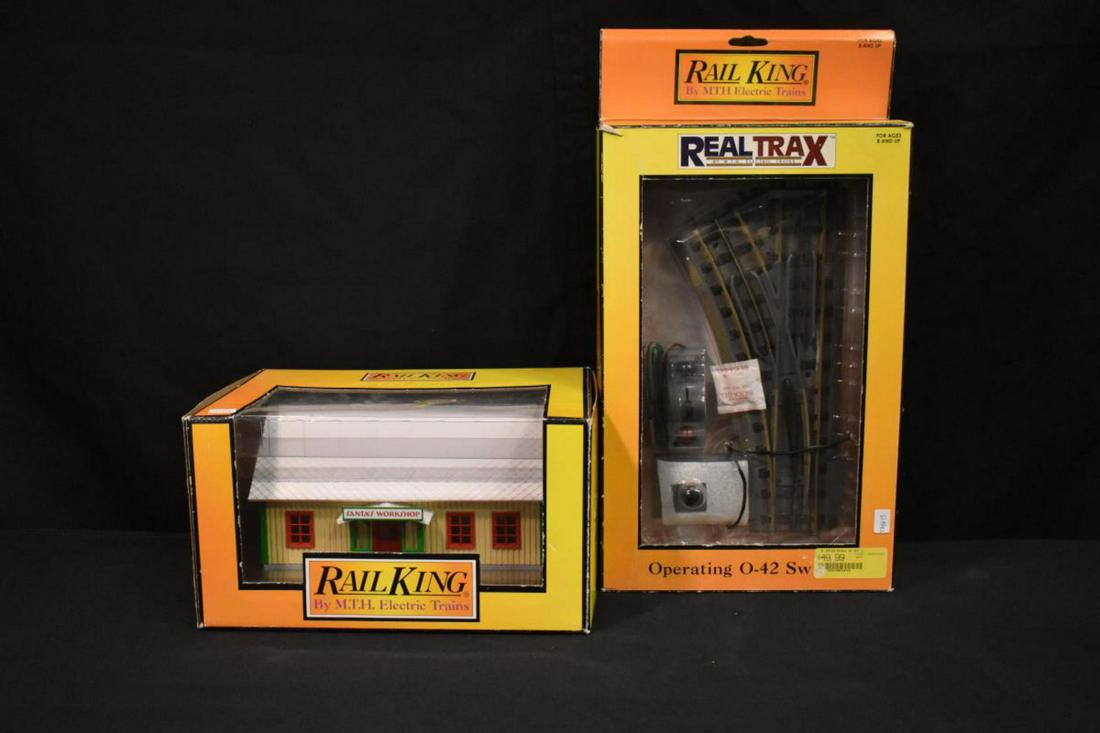 Rail King Train Collectibles: Rail King Train Collectibles. Consists of Rail King Santa's Workshop in the box. Intricately detailed ABS construction. Lighted interior. Unit measures 9 1/4"x6 1/8"x5". Rail King Operating 0-42 Switc
