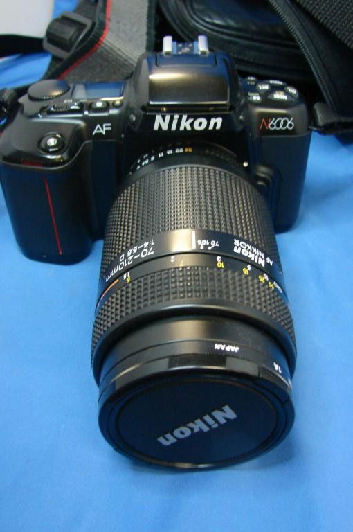 Nikon N6006 Camera & AF Zoom-Nikkor 35-77 mm lens: Nikon N6006 Camera & AF Zoom-Nikkor 35-77 mm lens, with original instruction book and leather case, spotless condition.