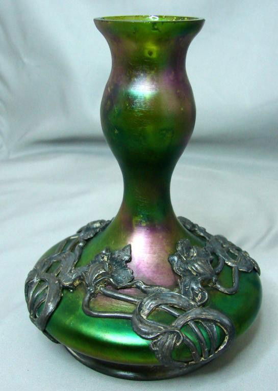 Art Nouveau Loetz Art Glass Vase Silver Overlay: Art Nouveau Art Glass Vase Silver Overlay, may be Loetz, iridescent green glass, silver bottom marked Apollo Silver Co. Loetz glass is frequently not marked.