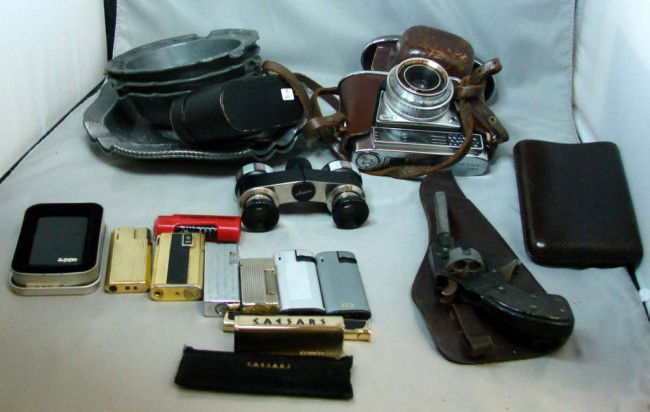Vintage lot: Lighters, cap gun, camera, pewter: Vintage lot consisting of 5 heavy pewter ashtrays, a pair of mother of pearl opera glasses, a Kodak camera, 10 lighters, leather case - may be a cigar holder, and a toy cap gun.