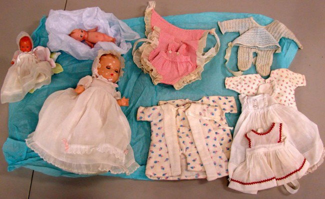 3 Antique Dolls: Effanbee, Story Book & Cupie Doll: 9" Doll incised Effanbee Patsy Babyette, composition w/swivel head, arms & legs, painted hair, sleep eyes, closed mouth, wearing original clothes plus several extra outfits. c1930-40, a painted Storyb