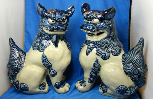 Pair of Chinese Earthenware Foo Lions or Foo Dogs: Pair of Chinese Earthenware Foo Lions or Foo Dogs, 13" tall x 10" wide.