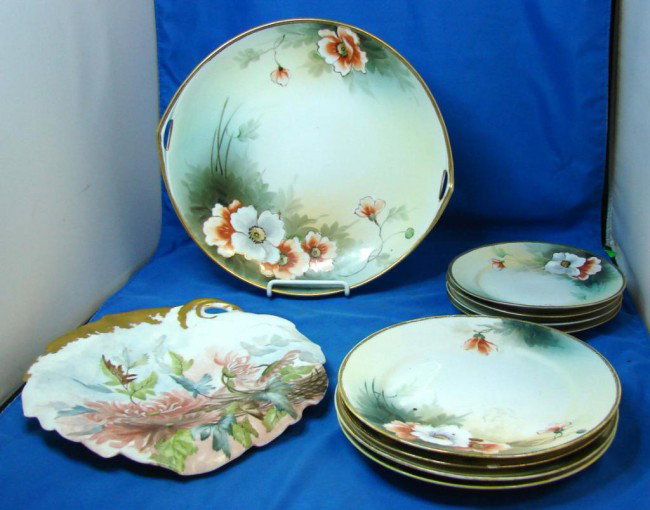 9 pc. Nippon Dessert Set & J. Pouyat Limoges Dish: Nippon Dessert set consisting of a cake plate 11" dia., & 8 dessert plates - 4 are 7.5" (one chipped) and 4 are 6"; also a beautiful Limoges hand painted dish by J. Pouyat, circa late 1800's.