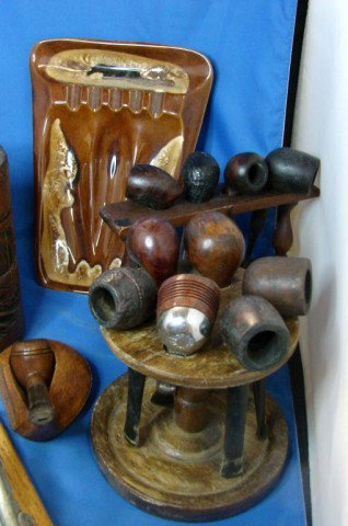 Huge Lot of Pipes, Humidors, Cigar Cutter, Ashtray: Lot of 35 used pipes, 3 pipe stands, 2 wooden humidors, a pipe cutter and a pottery pipe ashtray.