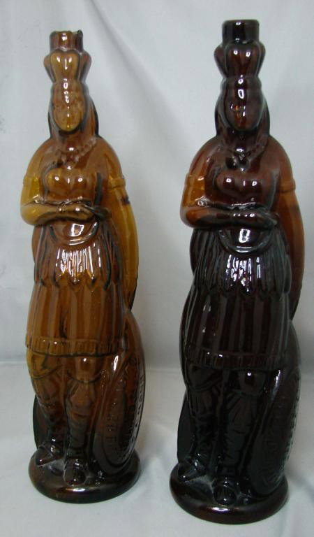 Pair Brown's Celebrated Indian Herb Bitters Bottle: Pair of Brown's Celebrated Indian Herb Bitters Bottles, one has cork in top and is marked patented Feb. 11 1868; the other has some chips on lip, marked patented 1867; no other chips that we see. Purc