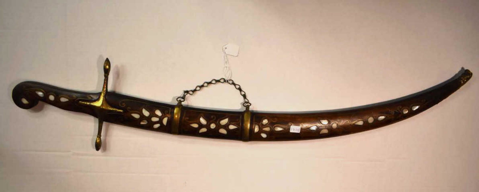 Decorative/Ceremonial Sword: Decorative/Ceremonial Sword. Incised blade with teakwood handle and sheath having mother-of-pearl and wire inlay with brass mounts, 34"l.