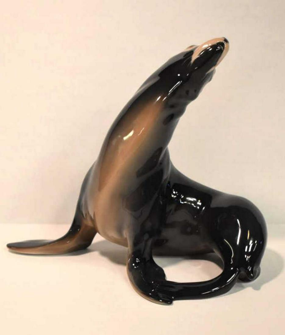 Bing & Grondahl Porcelain Sea Lion 1733: Bing & Grondahl Porcelain Sea Lion 1733 Figurine. Glazed finish. Gorgeous curvaceous figure in excellent condition. Properly hallmarked on the underside. 7" high.