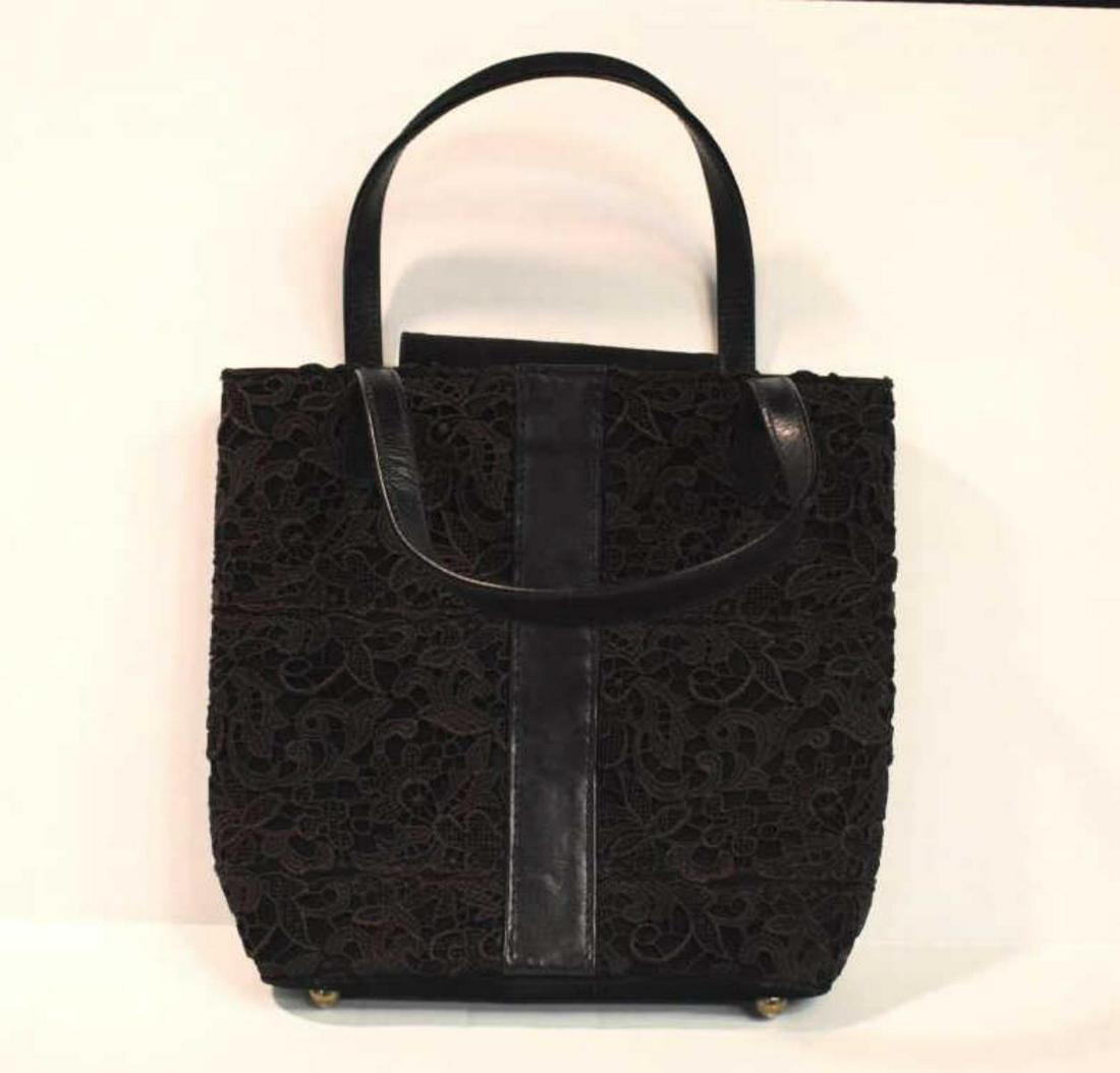 Stuart Weitzman Purse: Stuart Weitzman Purse. Suede flap over magnetic fastening. Black cloth and suede textured finish. Purse measures 8 1/2"x7 1/2". Comes with Stuart Weitzman bag to store purse in.