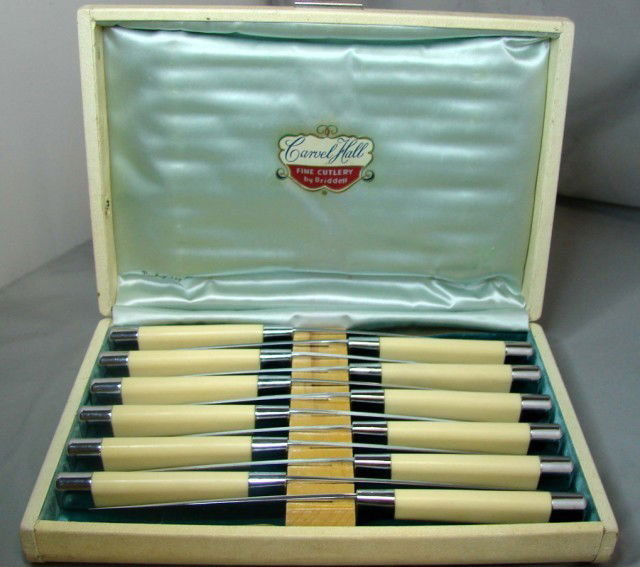 12 Bone Handle Steak Knives by Carvel Hall: Vintage 12 steak knives in fitted box by Briddell for Carvel Hall; handles may be bone.