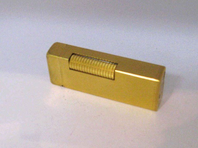 Vintage Dunhill Lighter: Vintage Dunhill lighter gold plated made in Switzerland B.L. monogram.
