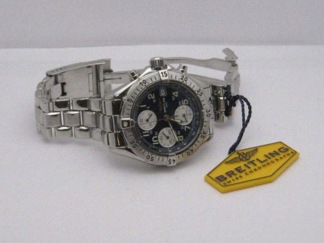 Man's Breitling Chronograph watch: Man's stainless Breitling Chronograph model A13035 blue chrono dial with date, sapphire crystal, water resistant to 100m. Good condition with original box.