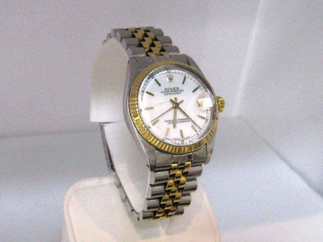 Rolex Midsize Datejust watch 18k/stainless: Rolex Midsize Datejust watch 18kyg and stainless with white dial and date,water resistant,auto mechanical movement,jubilee band and box and papers.