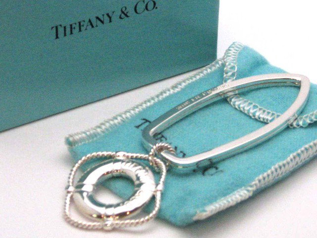 Sterling Lifeboat Key ring Tiffany & Co: Sterling lifeboat key ring by Tiffany & Co, 3" in length with pouch and box.