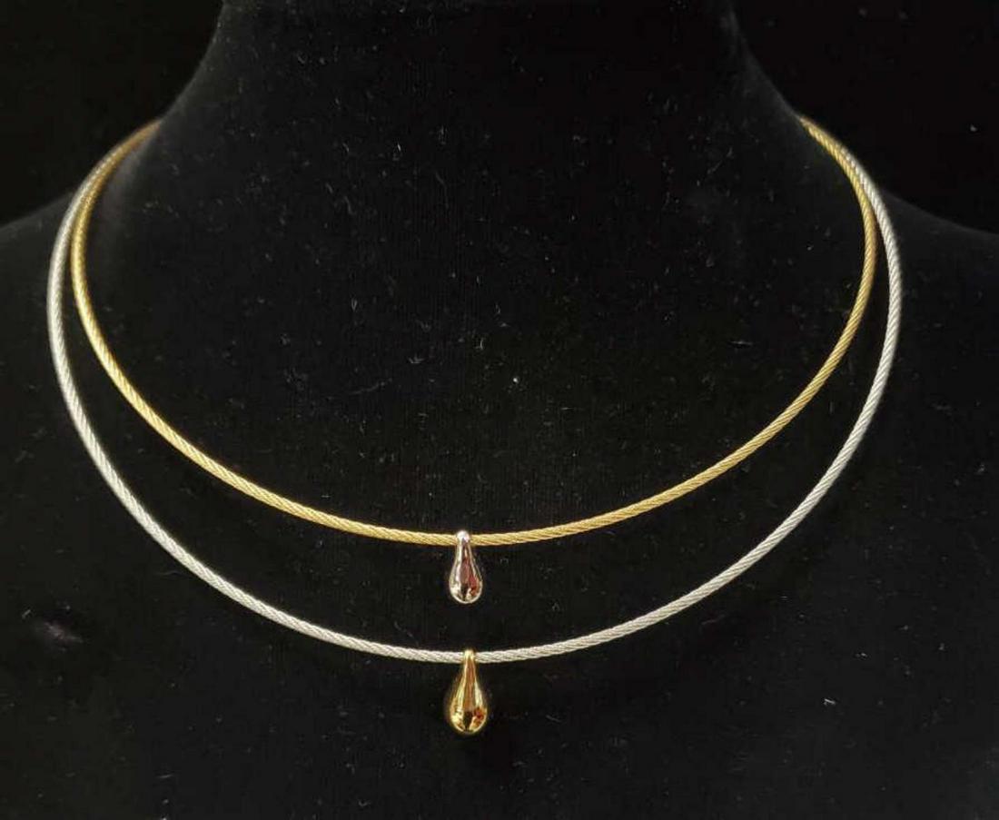 Ladies two tone Charriol teardrop necklace: Ladies two tone Charriol teardrop necklace featuring gold and silver toned twisted cable chains accented with alternating color teardrop pendants. Length 16".
