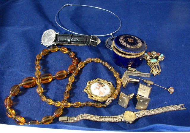Vintage costume jewelry: amber, pin, Limoges box: Lot of vintage costume jewelry including an amber necklace, semi-precious stone pin, cufflinks, watches, silver necklace, and a cobalt Limoges box.