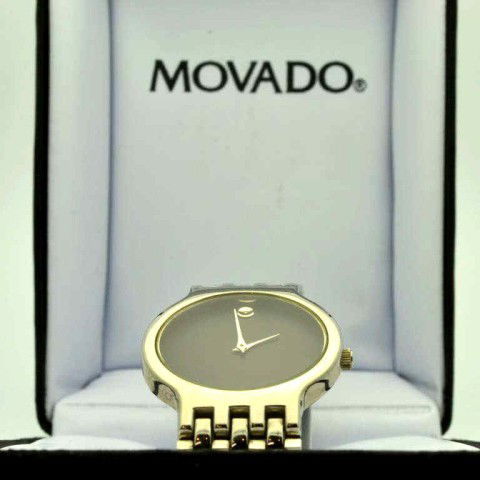Man's stainless Movado Museum watch: Man's stainless Movado Museum watch black dial, Swiss movement, water resistant and original box.