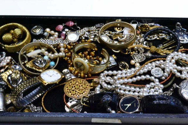 Lot of costume jewelry with Trifari: Lot of costume jewelry including cat's eye necklace, and Trifari.