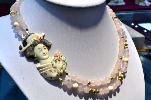 Collection of beaded jewelry: Collection of beaded jewelry; rose quartz necklace, 3 jade bracelets, amethyst and jade necklace and black jade earrings.