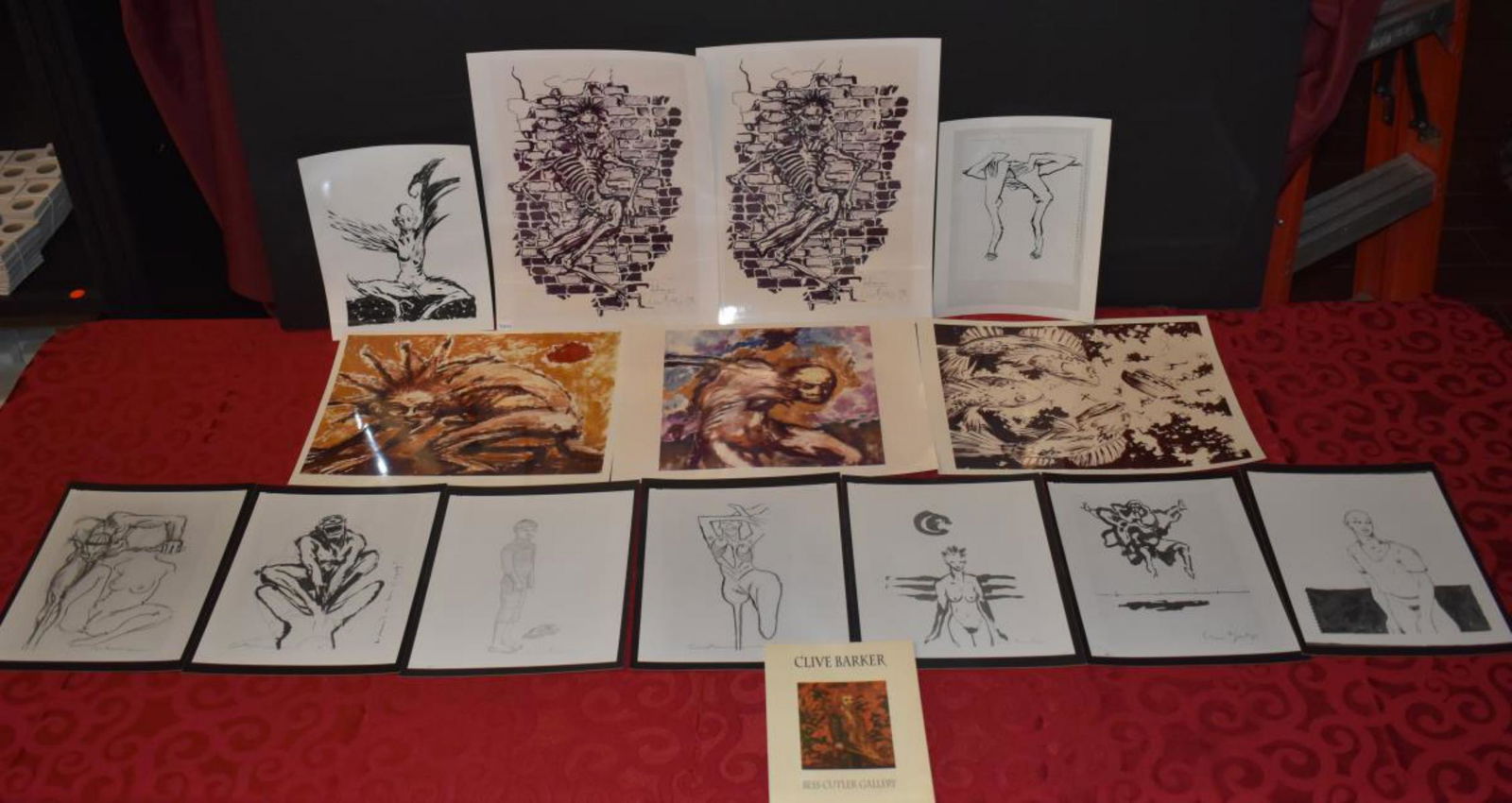 Group Of Clive Barker Paintings & Drawings: Group Of Clive Barker Art. Consist of 9 black and white Photos measuring 11"x8 1/2". Some of the art is done in pencil. All are artist signed. 5 colored art measuring 14"x11". All are artist signed. C