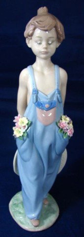 Retired Lladro - A Pocketful of Wishes: Retired Lladro "A Pocketful of Wishes" #7650, 11", issued 1997 ltd. ed sold out, tiny chip off one yellow flower (see photo) no other chips; original box.