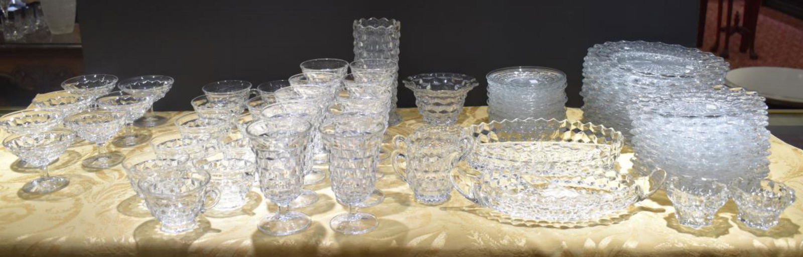 Clear Fostoria Set: Clear Fostoria Set. 73 total pieces in the set. Consists of 12 dinner plates measuring 9 1/2" in diameter. 12 salad plates measuring 8" in diameter. 12 saucers measuring 5 1/2" in diameter. 11 coffee