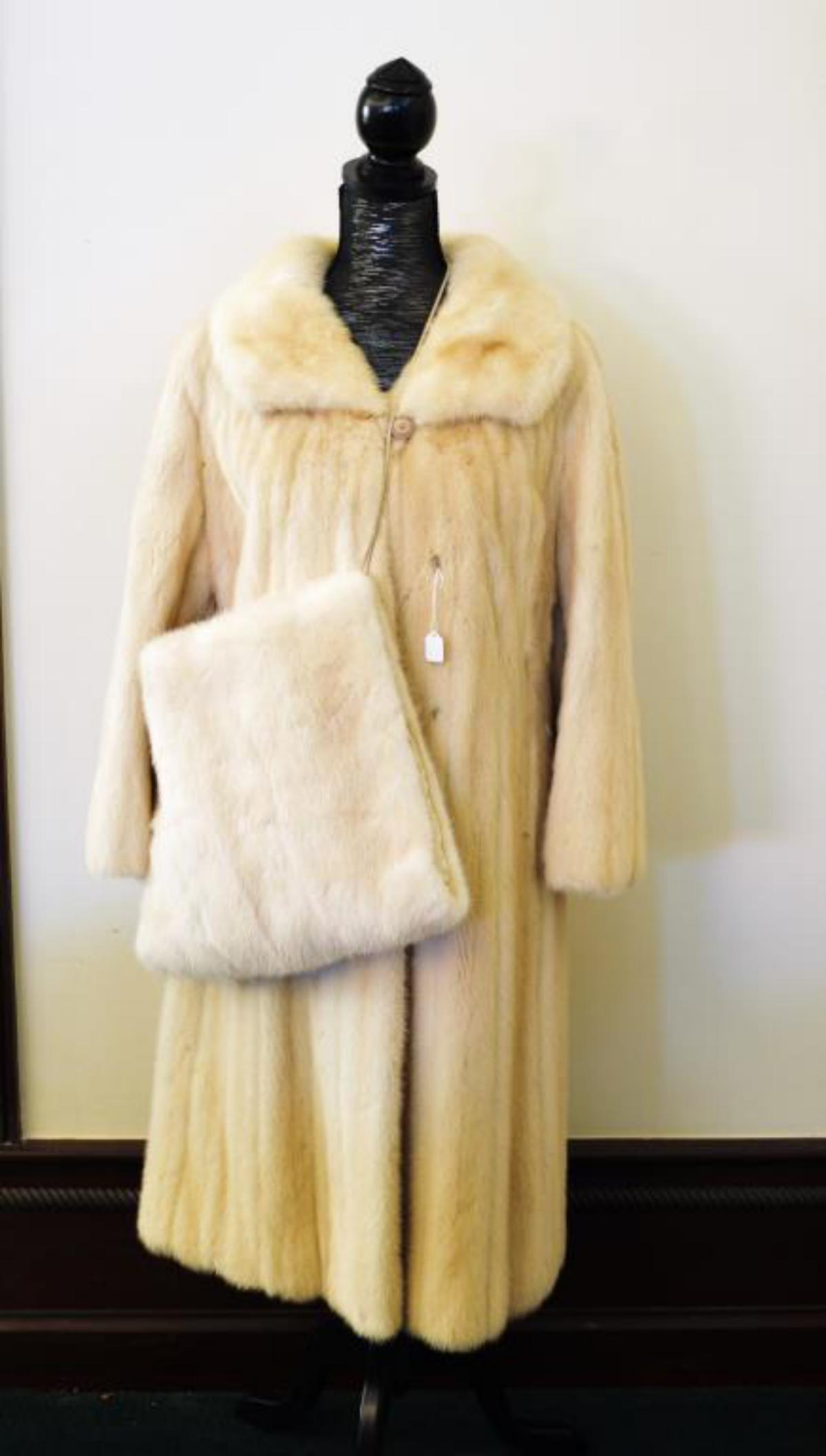 World Renowned Flemington furrier's Blonde Mink: World Renowned Flemington furrier's Blonde Mink Coat, with matching Muff/Hand warmer. Approx size 42" collar to length, 19" shoulder to shoulder, 22" shoulder to cuff, 11.5" under arm to cuff, 28.5 un