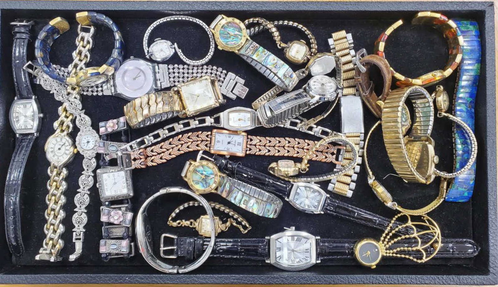 Lot of costume watches: Large lot of ladies costume dress watches with various fancy link bracelets and additional bands. None are currently running and are in various conditions due to wear.