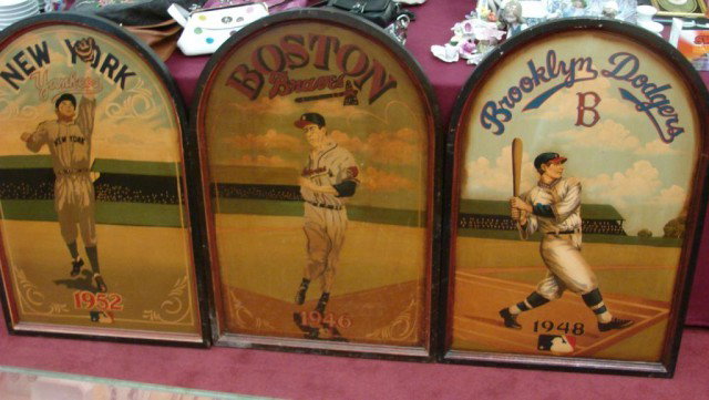 3 Baseball Wall Hangings: Dodgers, Yankees, Braves: 3 Baseball Wall Hangings painted on wood: Brooklyn Dodgers, New York Yankees, Boston Braves, 36" h x 24" w and a framed picture of Babe Ruth & Lou Gehrig, 13" x 16". As Is.