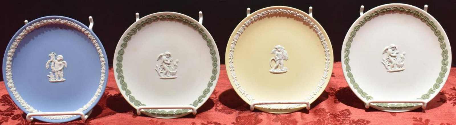 Wedgwood Four Seasons Plates: Wedgwood Four Seasons Plates. All plates come in Wedgwood boxes. Plates measure 6 1/2" in diameter. Consists of White On Pale Blue T.W.C.S Summer Plate. Jasper Sage Green On White T.W.C.S Winter Plate