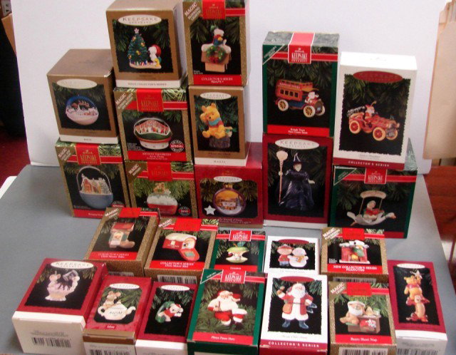 24 Hallmark Xmas Ornaments w/boxes Hop N Pop: 24 Hallmark Xmas Ornaments w/boxes includin g Hop N Pop Popper, Bringing Home the Tree, Arctic Dome, Witch of the West, Peanuts & Fireplace, Kringle Tours & more