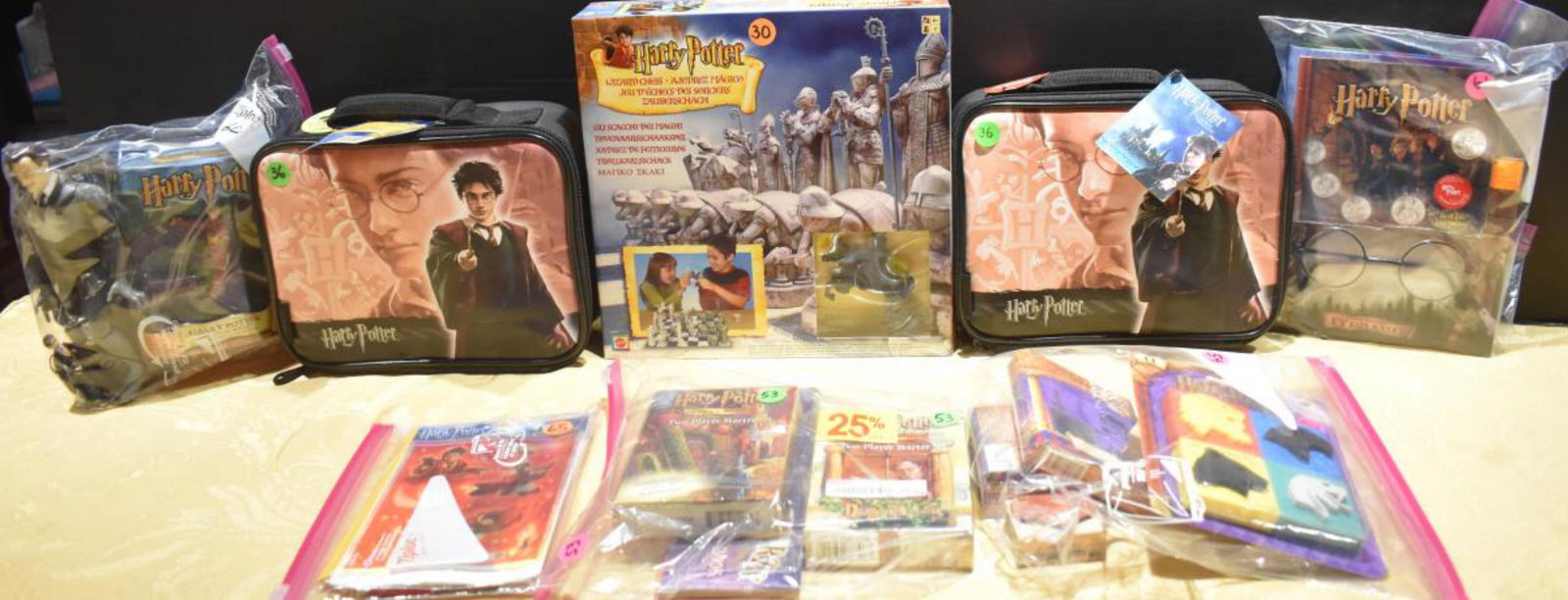 Lot of Harry Potter Collectibles, & Games: Lot of Harry Potter Collectibles, & Games, includes assorted craft stamps, trading card games stickers, 2 Harry Potter lunch boxes, Wizard Chess Set, 5 medallion set, Journal, and more