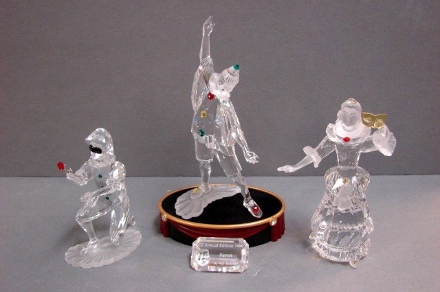 Swarovski Masquerade Pierrot, Columbine, Harlequin: Swarovski Crystal Masquerade Series - Pierrot with stand and plaque, Columbine, and Harlequin with 9 extra roses that can lay at his feet when displayed; all in like new condition with original fitted