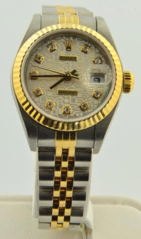 Lady's Rolex Datejust 2001 1/2 w/box & papers: Lady's stainless and gold Rolex Datejust 2001 1/2, with Silver Jubilee Dial, Model 79173, with box and papers.