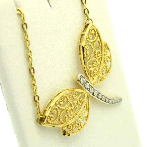 14k 2tone butterfly necklace: 14k 2tone butterfly necklace 4.5gr, yellow wings with white diamond cut body, 16" in length.