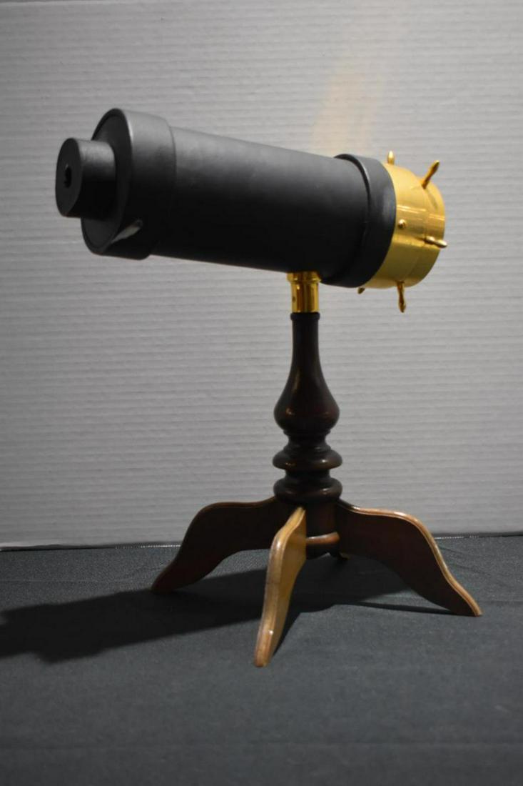 Vintage Table Top Kaleidoscope: Vintage Table Top Kaleidoscope. Rare, Vintage Charles G. Bush Kaleidoscope in brass and leather by Van Cort. Mahogany splayed legs, one with signature, "C.G. Bush Patent Nov 17th 1874". Brass cylinder