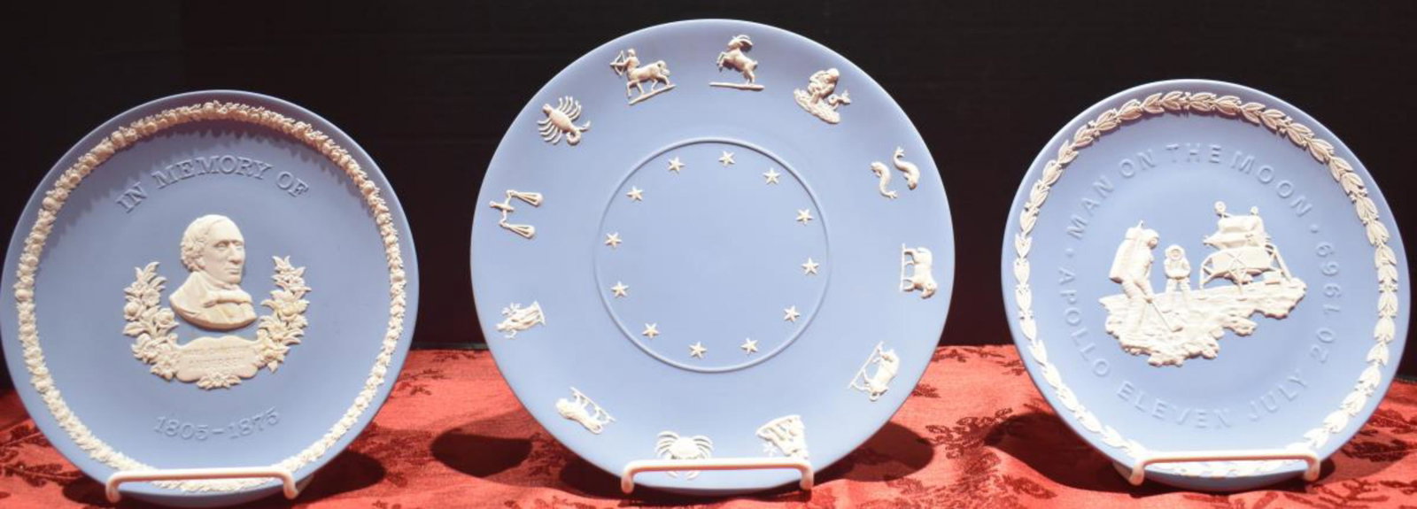 Trio Of Wedgwood Plates: Trio Of Wedgwood Plates. Each plate comes in original Wedgwood box. Plates measure 8" in diameter. Consists of Hans Christian Andersen(1805-1875) Centenary Edition 1975. The Apollo Plate By Wedgwood i