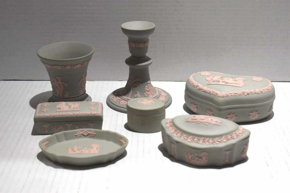 Group Of Wedgwood Grecian Pink Collectibles: Group Of Wedgwood Grecian Pink Collectibles. Total of 7 pieces of Wedgwood in the group. Pink and grey color. Consist of mini oval trinket box. Measures 1 1/2" in height. Oblong trinket box. Measures 