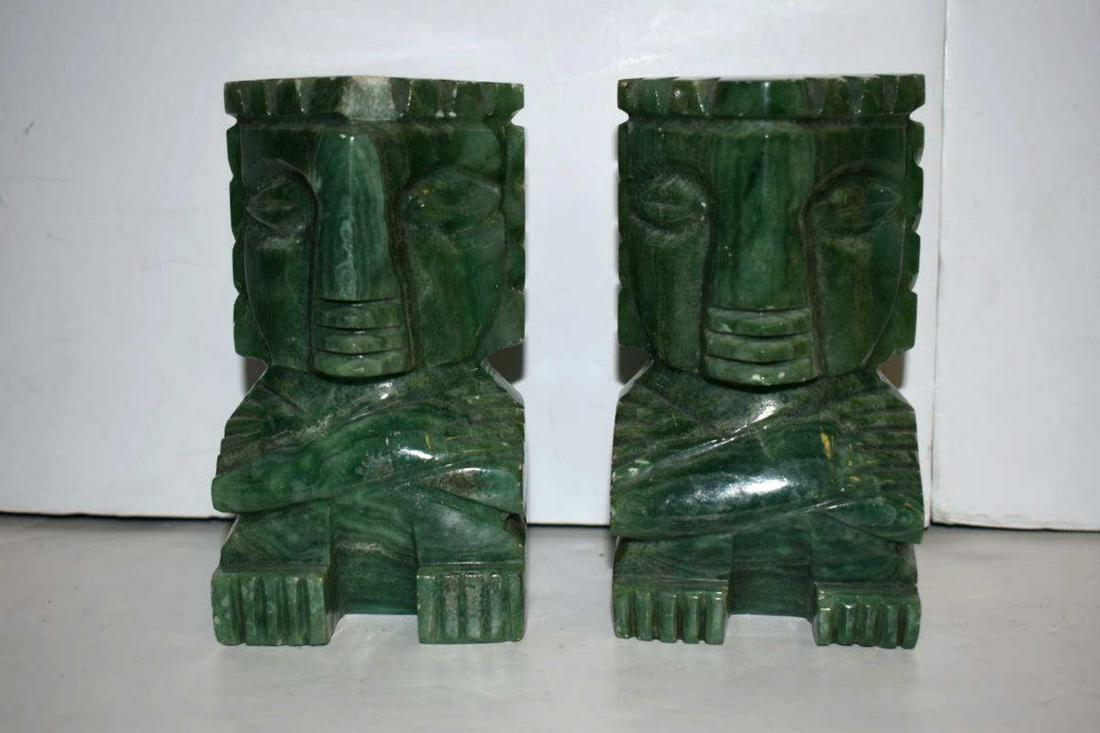 Pair of Bookends: Pair of Bookends. Green dyed stone in the form of ancient figures, 5 1/4"h.