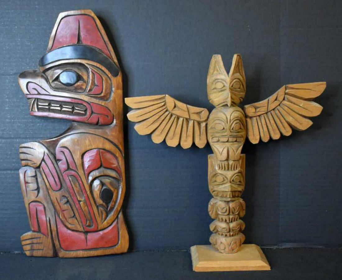 Pair Of Native American Collectible: Pair Of Native American Collectible. Consists of a hand carved wood eagle totem pole. Stands 13" in height. Together with a hand carved wood deco wall hanging. Stands 15" in height.
