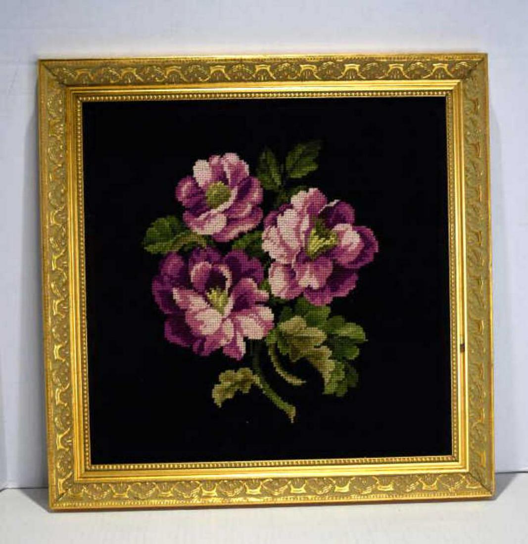 Framed Needlepoint Art: Framed Needlepoint Art. Measures 19"x19". Gold Ornate frame. Needlepoint of flowers with solid black background. Needlepoint art is in great condition.