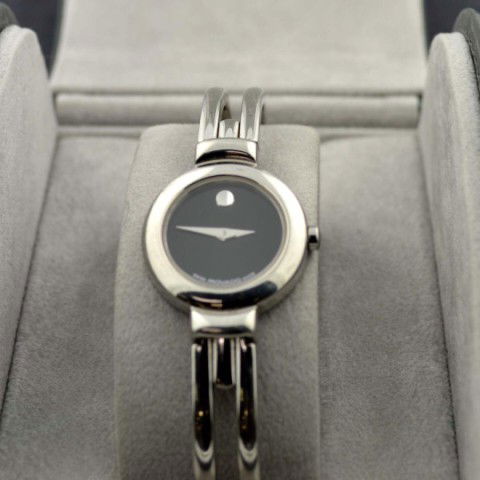 Ladies MOVADO Watch Black Dial and Silver Bracelet: Ladies MOVADO Watch with Box and Papers, Silver Color with Split Link Band and Black Dial.