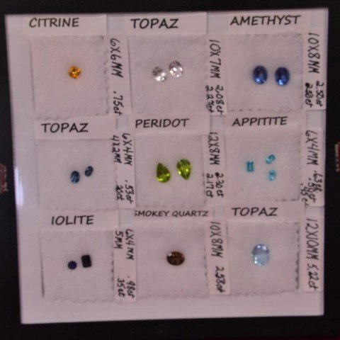 36 Framed Genuine Gems: 36 Framed Genuine Gems...Multiple sizes and kind...Iolite, Ametrine, Topaz , many sizes and shapes in a 4 frames