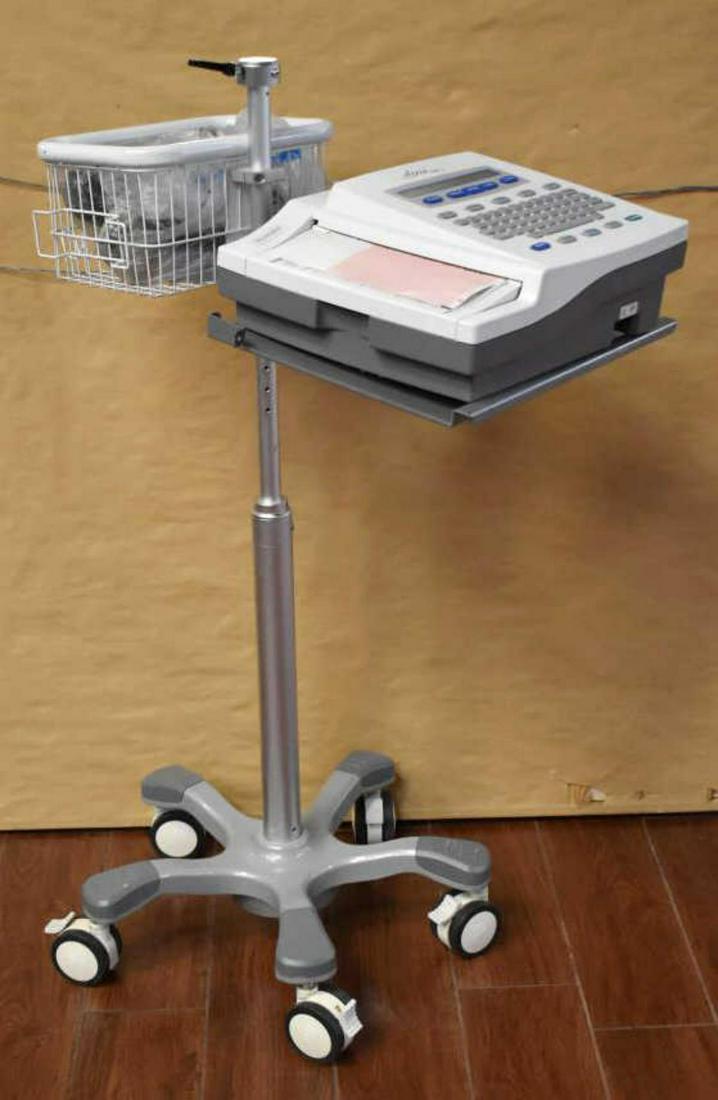 Burdick Atria 3100 Interpretive ECG-EKG Machine: Burdick Atria 3100 Interpretive ECG-EKG Machine, with mobile medical stand.